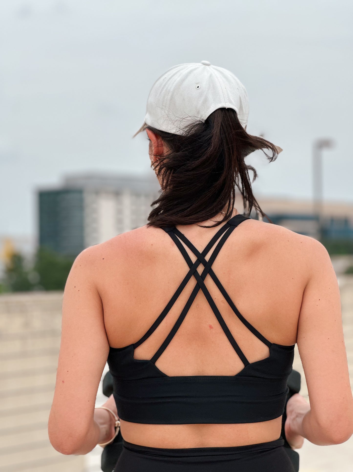 Crossed back black sport bra